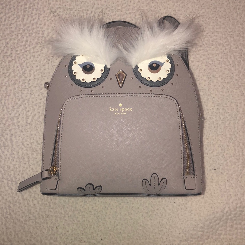 Grey Kate Spade backpack Feel free to make Offers